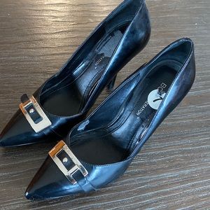 BCBG generation  ladies pumps in size 7. Black with silver buckles on the front.
